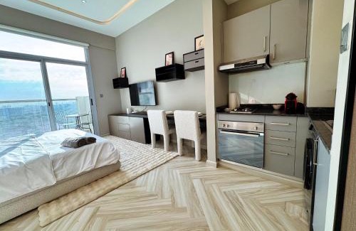 Discovery Gardens Apartment | Warm and Elegant Studio in Dubai
