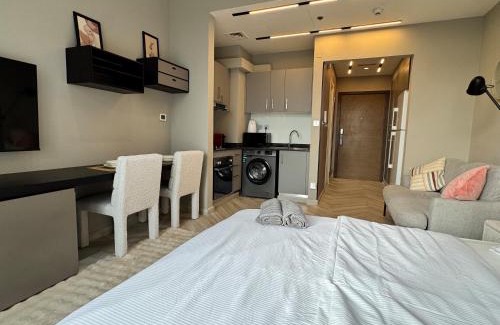 Discovery Gardens Apartment | Warm and Elegant Studio in Dubai