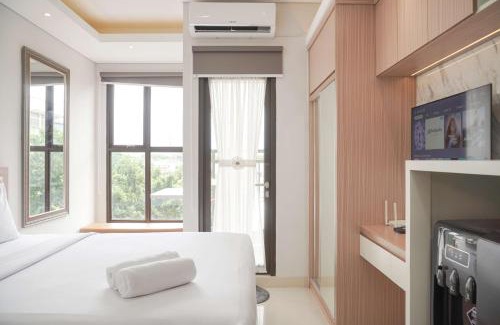 Ciputat Apartment | Warm and Minimalist Studio Transpark Bintaro Apartment By Travelio