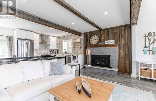 Wasaga Beach Cottage | Warm up in our Cozy Home with Serene views of Georgian Bay!