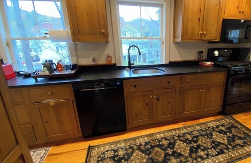 Warren House | Warren Village home steps from bubbling brook