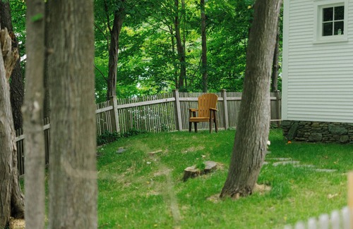 Warren House | Warren Village home steps from bubbling brook