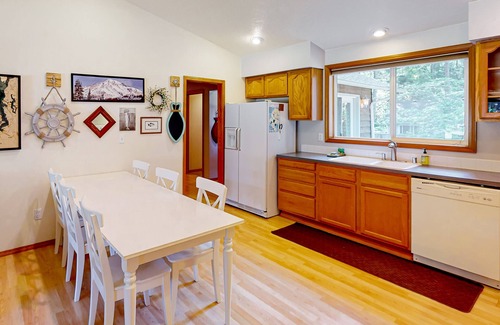 Anderson Island House | Water-view home & bunkhouse with lake access, canoe, kayaks, firepit, & W/D