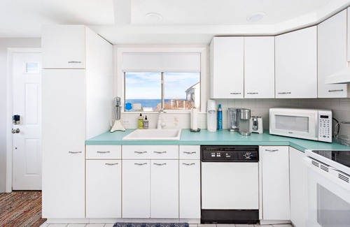 Jamestown Shores House | Waterfront A-frame Chalet with shore beach overlooking Narragansett Bay