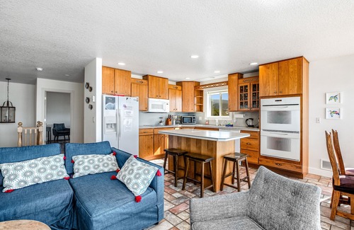 Rockaway Beach House | Waterfront, dog-friendly home a few steps from the beach with hot tub
