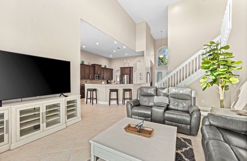 Burnt Store House | Waterfront dog-friendly house with pool, dock, pool spa, patio & sunrise views