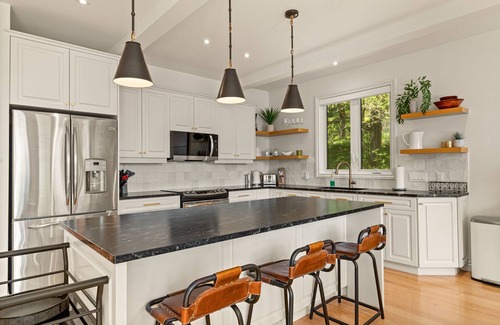 Tay Valley House | Waterfront dream cottage with hot tub, pool table, and fire pit