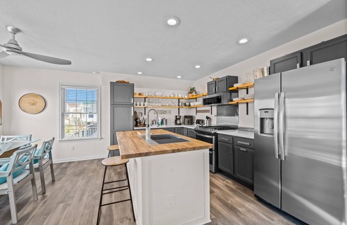 Colington Harbour House | Waterfront home and Oasis with private dock, outdoor bar and firepit