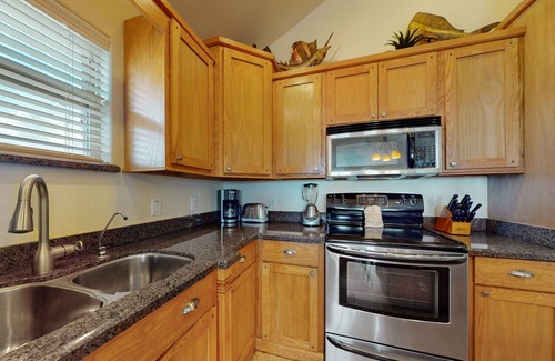 Port Isabel Cabin | Waterfront Home w/ Large Covered Deck & 2 Pools - Direct Access to Channel