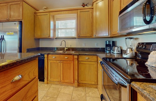 Port Isabel Cabin | Waterfront Home w/ Large Covered Deck & 2 Pools - Direct Access to Channel