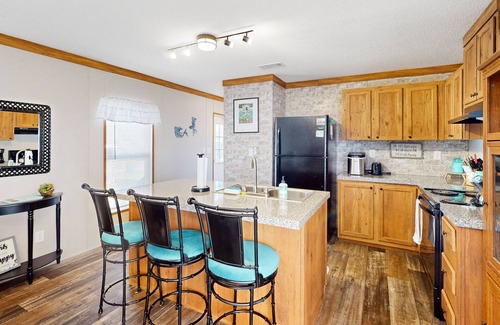 Weeki Wachee Gardens House | Waterfront home with amazing yard, firepit, grill, putting green, AC, & W/D
