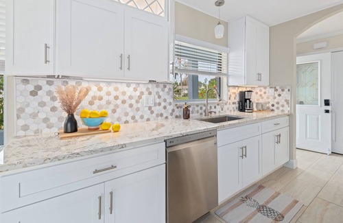 Convair Cove House | Waterfront Home with Dock | Heated Pool | 4.5 Blocks to Beach & Downtown