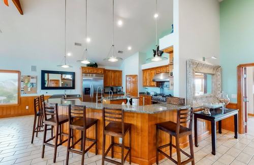 Sunset Village House | Waterfront home with ocean views, private pool, hot tub, & Tesla/EV charger