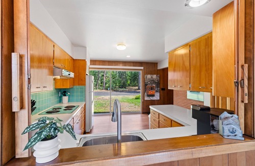 Post Falls House | Waterfront home with retro flare - private dock w/boat slip & game room