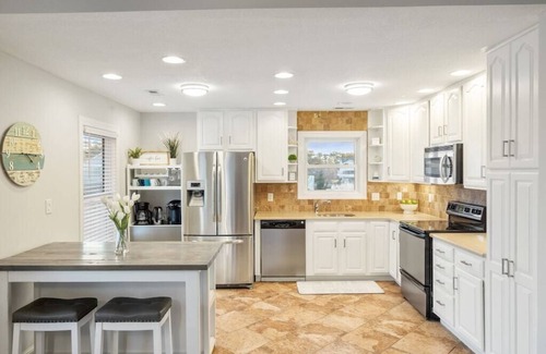 Colington Harbour House | Waterfront! Hot Tub, Game Room,Theater Room, Kayaks, SUPs, FirePit, YMCA! DogsOK
