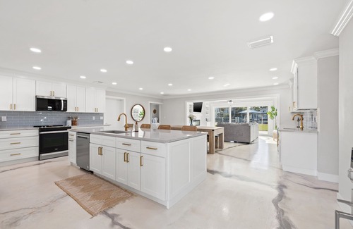 Palm Harbor House | Waterfront Island Oasis FULLY REMODELED! W/BOAT DOCK!