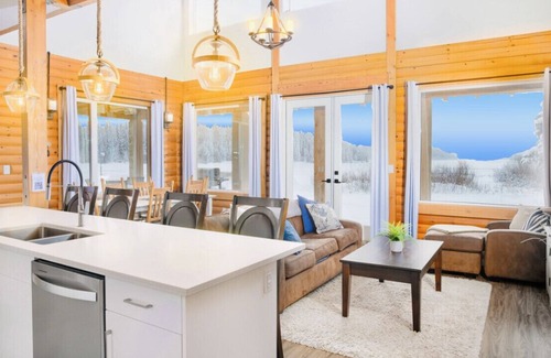 Central Okanagan Ski Chalet | Waterfront Kelowna Cabin #1 sleeps 15 has a private hot tub & is pet friendly