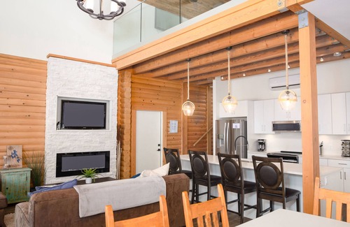 Central Okanagan Ski Chalet | Waterfront Kelowna Cabin #1 sleeps 15 has a private hot tub & is pet friendly