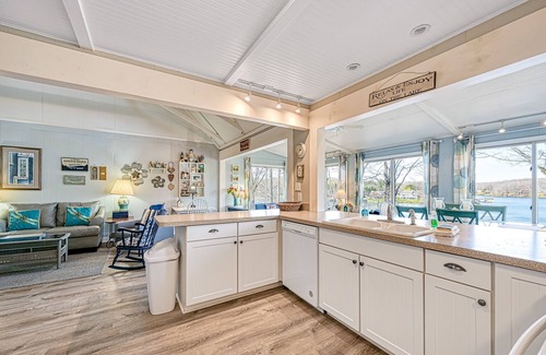 Moneta Cottage | Waterfront lake-view home with dock, fireplace, pool table, kayaks, & firepit