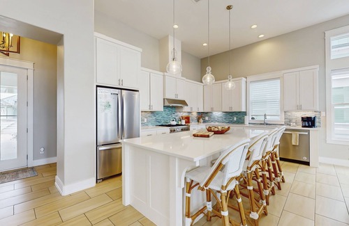 Rockport House | Waterfront luxury with private dock, outdoor kitchen, infinity pool & pier