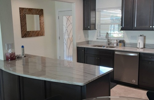 Indian Rocks Beach House | Waterfront Retreat: Pool Table, Dock, Golf Cart!