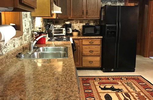Lac du Flambeau House | Waterfront: sleeps 10. Pets Ok. Beef-o-Rama Fall Pontoon Specials!