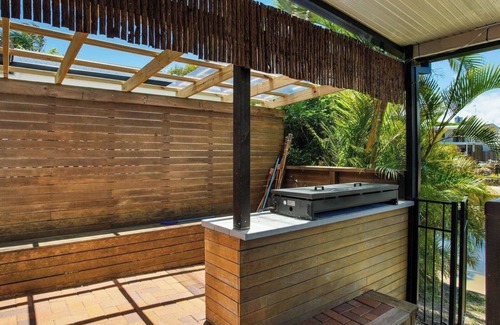 Broadbeach Waters House | Waterfront vista East facing to water pretty view day and night.