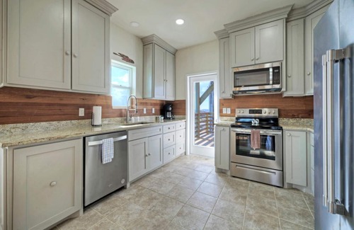 Flour Bluff House | Waterfront w/Bay Views, Shared Pool & Boat Dock | Marlin Madness by AvantStay