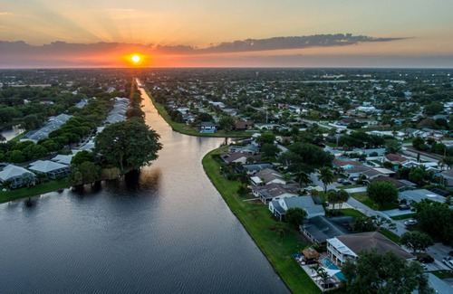 Florida North Atlantic Coast Villa | Waterfront w/ Beach, Htd Pool Cinema Gameroom Tiki