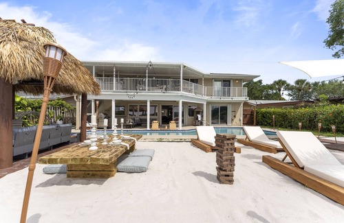 Florida North Atlantic Coast Villa | Waterfront w/ Beach, Htd Pool Cinema Gameroom Tiki