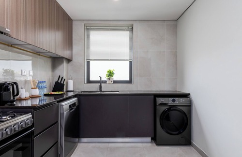 Dubai Apartment | Waves - Stylish 1BR Close to IMG World & Global Village