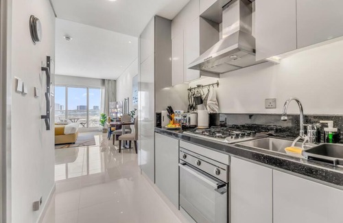 Dubai Investment Park Apartment | Waves - Stylish Studio with Balcony in Dubai South