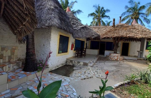 Galu Kinondo Cottage | We are located in Galu Beach opposite lantana Hotel.