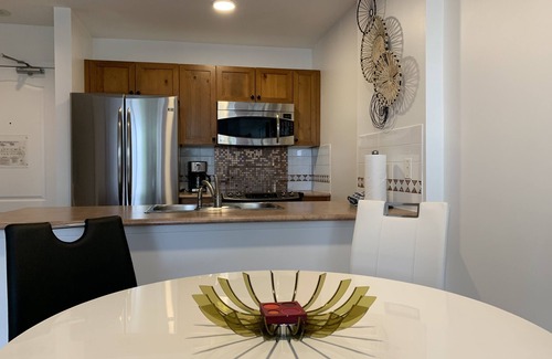 Village North Condo | Welcome to our 1BR Top floor Unit at Town Plaza