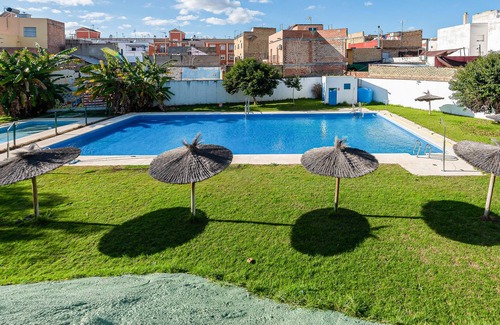 La Algaba Apartment | Welcome to this apartment with shared pool outside Seville.