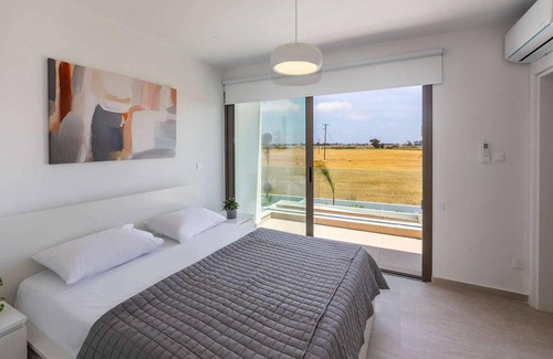 Softades House | Welcome to this stunning, modern villa, which sits within an exclusive gated complex surrounded by f