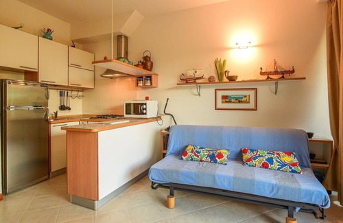 Piombino Apartment | Welcome to this vacation apartment with shared pool.