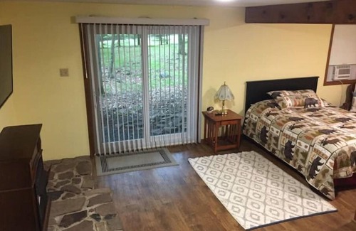 Briar Crest Woods Ski Chalet | Welcoming cozy Chalet with stone gas fireplace, fire pit on front deck