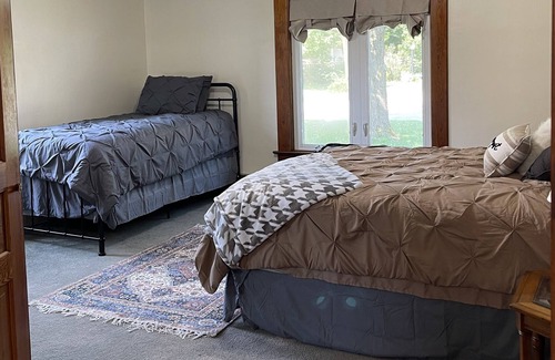 Marshall House | Welcoming hometown retreat with pool, hot tub and fenced in yard.