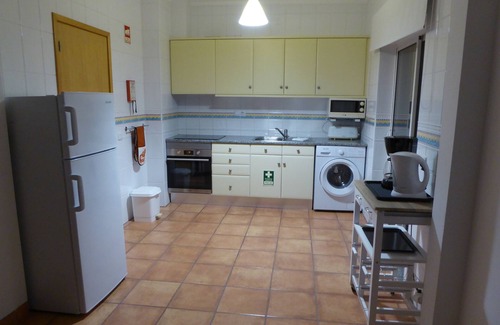 Porto de Mos Apartment | Well-equipped apartment with sun-drenched balcony