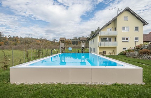 Tettnang Apartment | Well-Furnished Apartment “Lilie” on Farm close to Lake Constance with Wi-Fi, Terrace, Garden & Pool; Parking Available