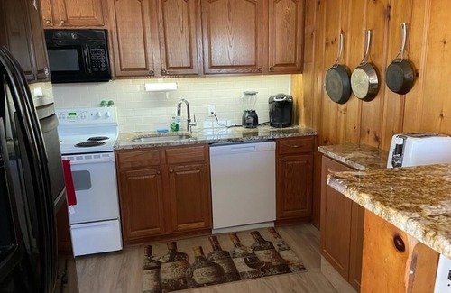 Harvey Cedars Apartment | Well maintained first floor duplex close to the ocean and bay beach in Harvey.