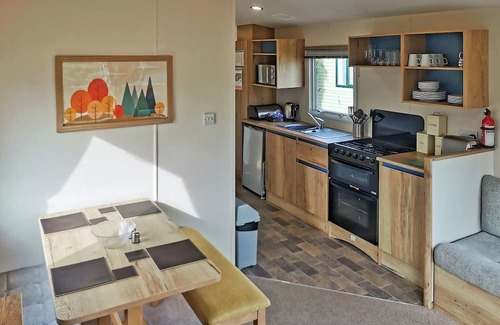 Narberth House | Well presented 12ft-wide caravan with one double and one twin.