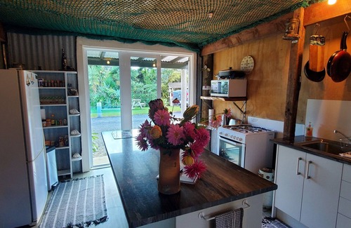 Coromandel House | Western Theme Mural,Private,Unique,Rustic,Sea Views,Sunsets,Bush,Pet friendly.