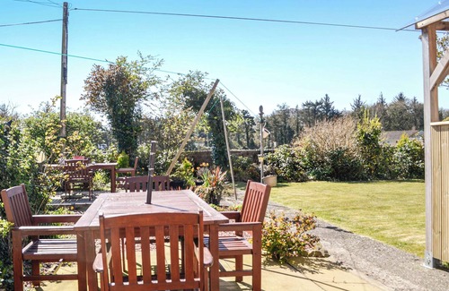 Stranraer Cottage | Where better to enjoy the hot tub in this delightful and private garden.
