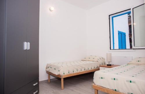Santa Maria Navarrese Apartment | White & Blue