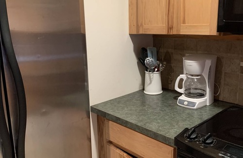 Tawas City Cottage | (White House Cabin) Serene Lakefront 4 Bedroom Cottage - Pets OK