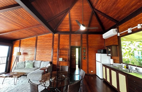Brewers Bay Cottage | Whole Bayview Cottage with large deck and sea view, mid-way to beaches and town.