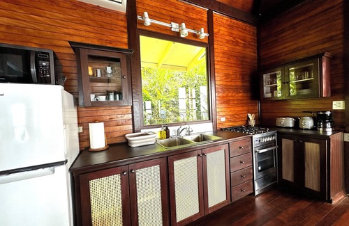Brewers Bay Cottage | Whole Bayview Cottage with large deck and sea view, mid-way to beaches and town.