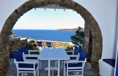 Tinos House | Windmill and houses by the sea // Stavros Bay